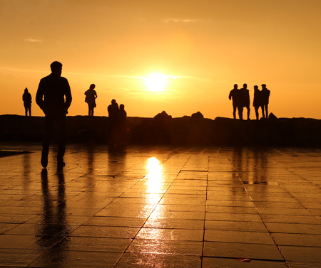 silhouettes of peopleの写真素材