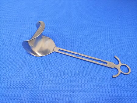 Doyen Abdominal Retractor In Blue Background