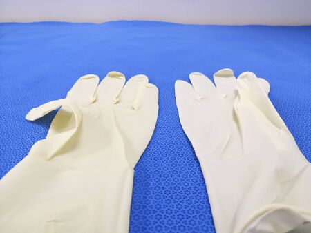 Closeup Image Of Medical And Surgical Paired White Glovesの写真素材