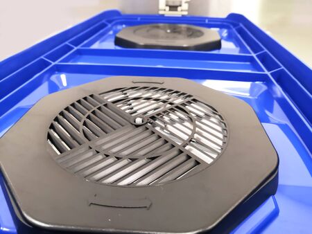 CLOSEUP IMAGE OF LID AND FILTER OF THE STERILIZATION CONTAINER