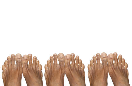 Three Pair Of Feet Of Human Adults. Selective Focusの写真素材