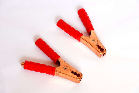 Closeup Image Of Car Red Jumper Clamp In White Background
