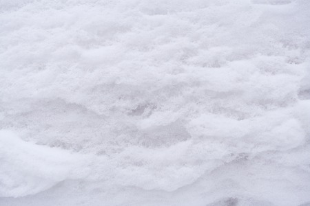 Natural background. Close-up white porous, friable snowy surface.の写真素材