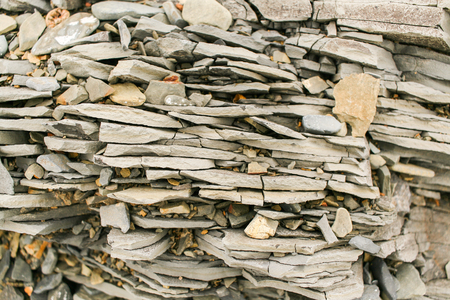 Close-up horizontal layers with shards of grey mountain slate.の写真素材