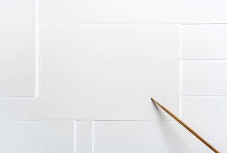 White paper blank minimalist layout with copy space and a wooden pointer on it.の写真素材