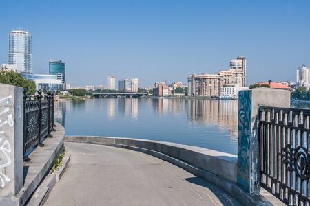 Yekaterinburg, Russia - August, 04,2016: View of Ekaterinburg city and Makarovsky bridge over the Iset river.のeditorial素材