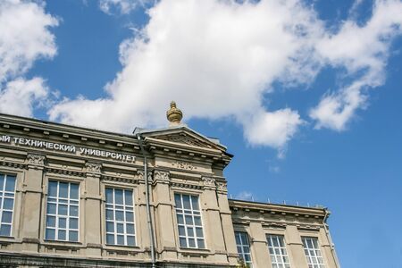 Syzran, Russia-August, 16,2016: The upper corner of the facade of the University building against blue sky.のeditorial素材
