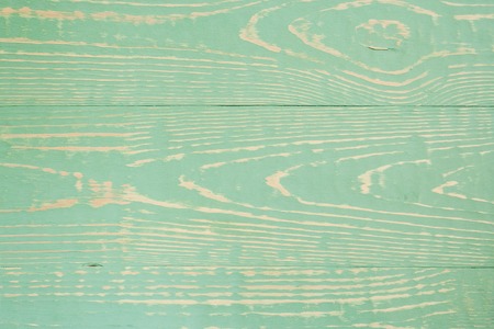 Close-up green painted wooden background with pattern of horizontal boards.の写真素材