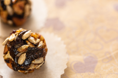 Close-up top view organic energy balls handmade on wrapping paper.の写真素材