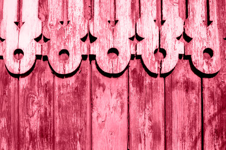 Close-up combined grunge wooden background. Weathered painted peeling wooden fence and shabby...