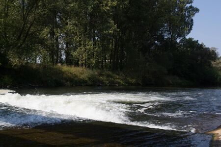 wild river with kayaksの写真素材