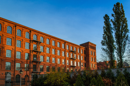 historic red brick buildings in Lodz, Polandの写真素材