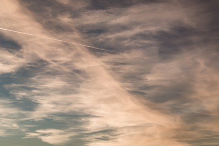 The sky lit up with the setting sun.の写真素材