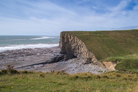 Coast with beach and monuments, Walesの写真素材