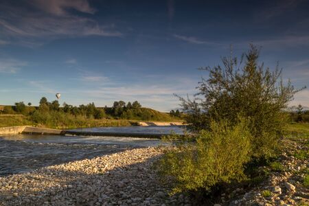 View of the Czarny Dunajec river and distant mountains.