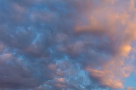 Colorful sunset with clouds.
