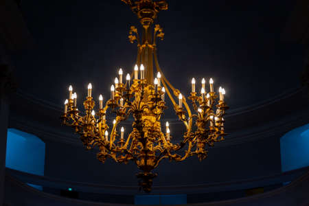 A chandelier with many light bulbs.の写真素材