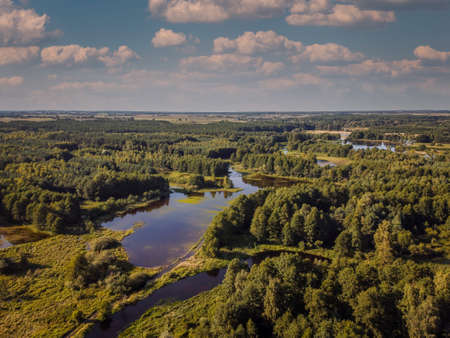 Flight over the small river in the center of Poland.の写真素材
