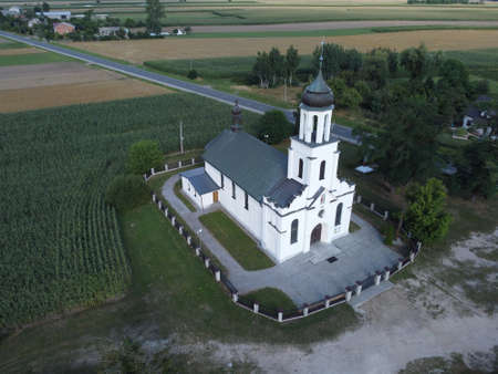 Church seen from above in the village of Brzykow, Poland.の写真素材