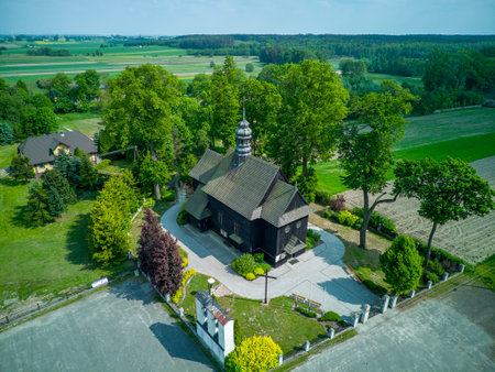 A wooden, historic church in the village of Suchcice, Poland.の写真素材