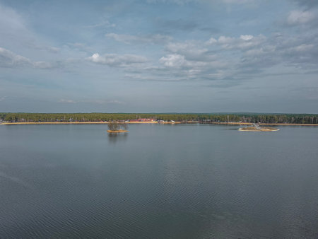 aerial view of the lake in summer with blue sky and white clouds