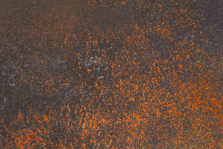 Orange and black abstract background with grunge texture. Background for design.