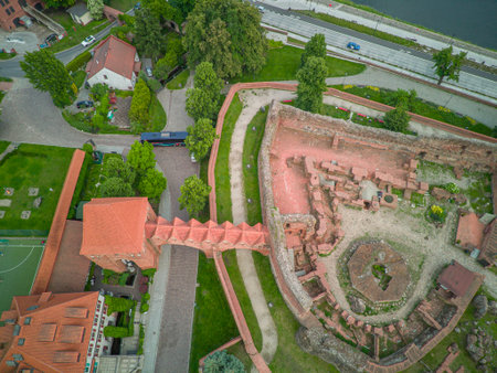 Castle Ruins in ToruÅ with a View of the Old Town on the Vistula River, Poland.の写真素材