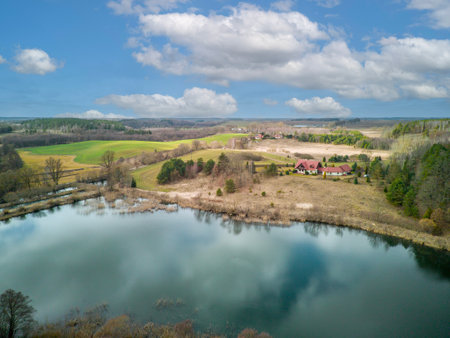 Aerial view of the small village on the bank of the riverの写真素材