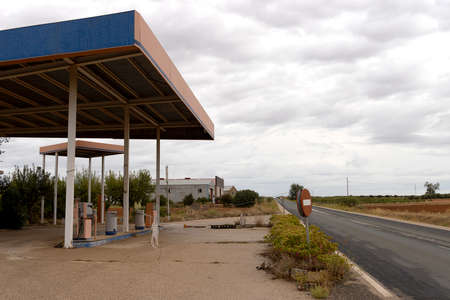 Abandoned gas station on a gray day