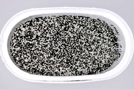 looking Inside of an activated charcoal water filter for domestic water purificationの写真素材