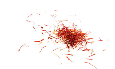 Isolated saffron collected in aragon in the jiloca river valley on white backgroundの写真素材
