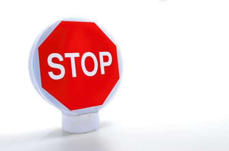 Forbidden traffic sign, stop on white background with shadows, road safety conceptの写真素材