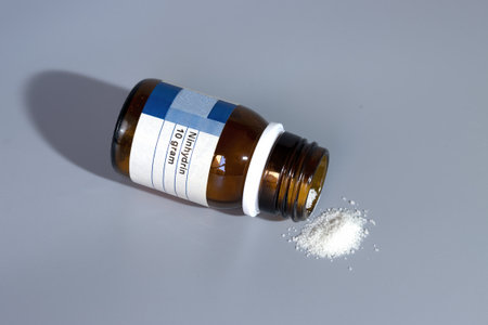 A bottle of substance, Ninhydrin, chemical used to detect amino acids, used by the scientific...