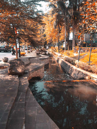 View of a small river at city hall, bandung indonesia.の写真素材