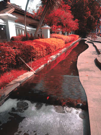 View of a small river at city hall, bandung indonesia.の写真素材
