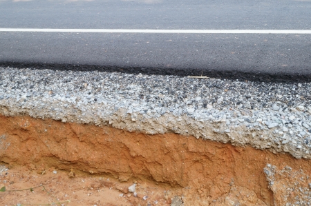 New asphalt road water soil erosion.の写真素材