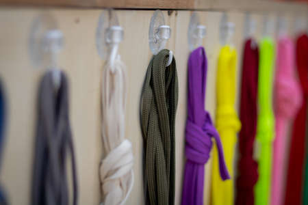 Shoelaces hanging on the stand
