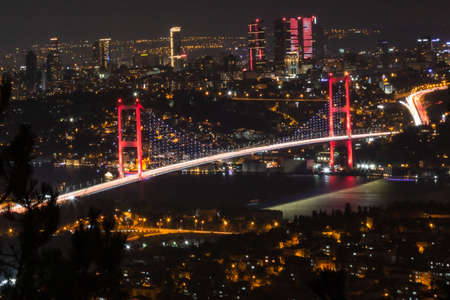 Bosphorus Bridge (aka 15th july martryr's bridge) at night in Istanbulの写真素材