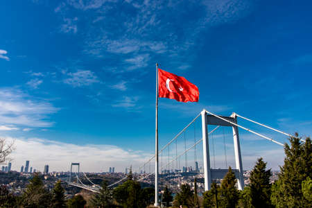 Flag of Turkey and Fatih Sultan Mehmet Bridge from Otagtepeの写真素材