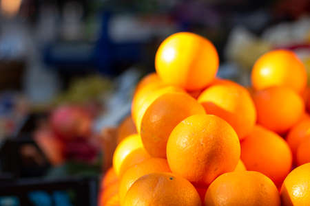 Oranges on the standの写真素材