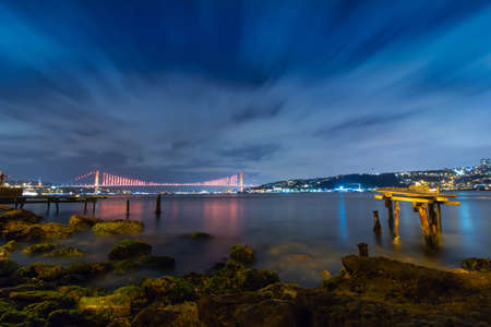 Bosphorus Bridge (aka 15th july martryr's bridge) at night in Istanbulの写真素材