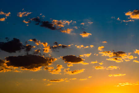 Silhouette of clouds at sunsetの写真素材