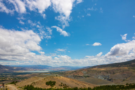 Landscape of the hills and cloudy sky from top of hill. Hills and plains in summer.の写真素材
