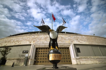 Istanbul Turkey - 12.29.2020: Black Eagle statue and Besiktas Vodafone Park Stadium in Istanbul. Flags of Turkey and Besiktas Club on the background.のeditorial素材