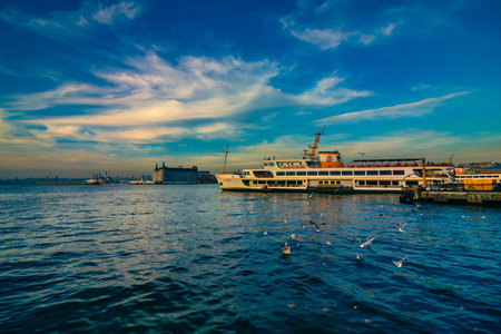Ferry near the Kadikoy Pier at sunset in Istanbulのeditorial素材