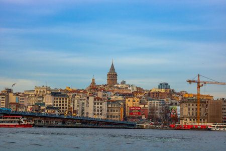 Istanbul Turkey, 01.07.2021: Galata Tower and Cityscape of Istanbul. Travel to Istanbul. Istanbul background photo. Karakoy district from Eminonu. Ferries and Galata Bridgeのeditorial素材