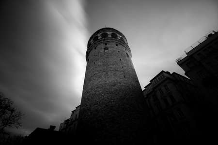 Grayscale and long exposure photo of Galata Tower. Black and white photo of Galata Tower. Galata Tower in Istanbul. Istanbul background photo.の写真素材