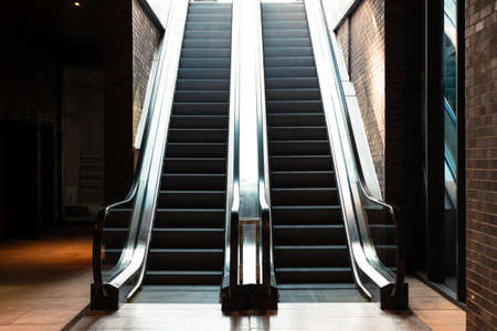 escalators Two Escalators in the building. Business or architecture or construction or shopping or...