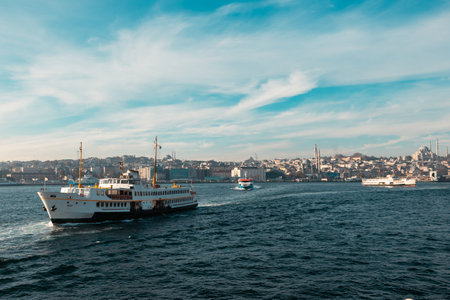 Istanbul and ferry. A ferry and cityscape of Istanbul on the background. Istanbul Turkey - 11.13.2021のeditorial素材