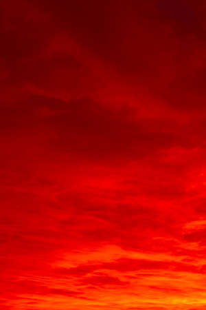Sunset or sunrise background photo. Red clouds at sunrise or sunset. Cloudscape concept.の写真素材